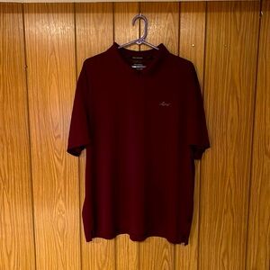 Very Good condition burgundy colored Greg Norman polo size XXL.
